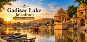 Gadisar Lake Jaisalmer with historic sandstone architecture and boats